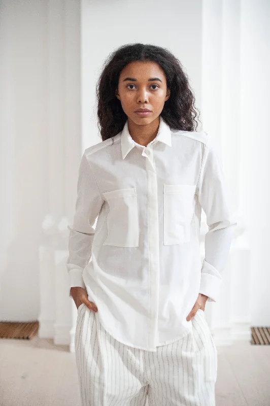 Elegant white women's wool shirt with patch pocketsSheer Shirts